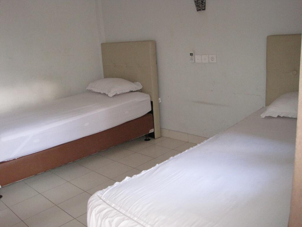 Taman Mekar Beach Inn Kuta Lombok Habitación foto